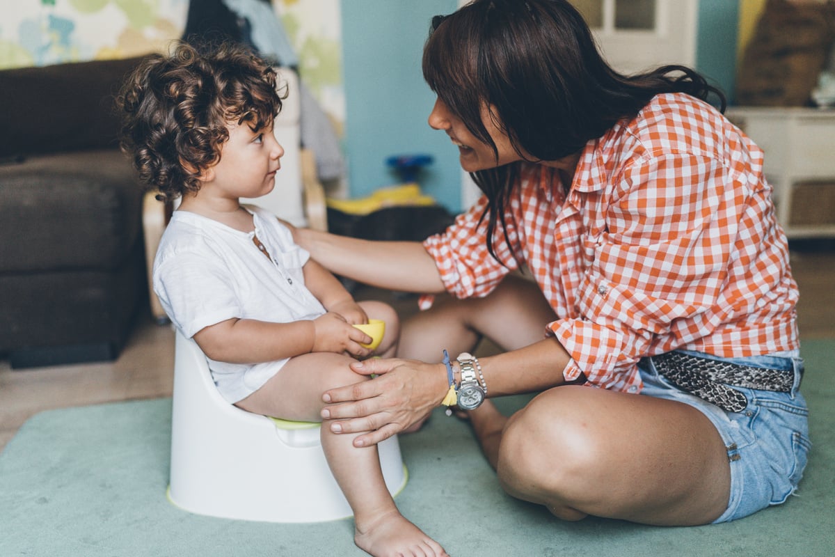 Mother Training Her Son to Use Potty